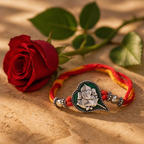Hand-Finished Paan-Leaf Ganesha — Enamel Brass Rakhi