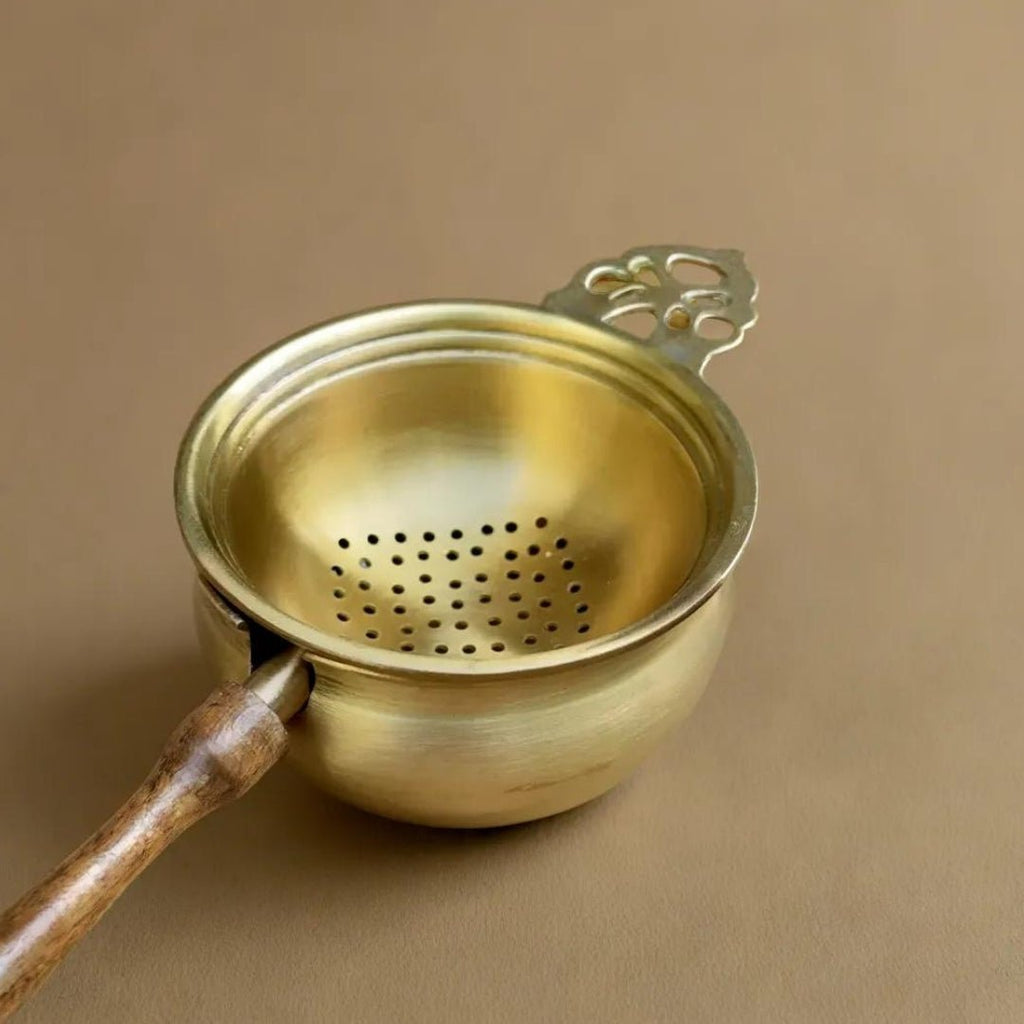 Tea Strainer and Bowl made with Pure Brass and a Wooden handle for Everyday Luxury Kitchen usage | Size 7.5 cm by 21 cm