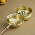 Tea Strainer and Bowl made with Pure Brass and a Wooden handle for Everyday Luxury Kitchen usage | Size 7.5 cm by 21 cm