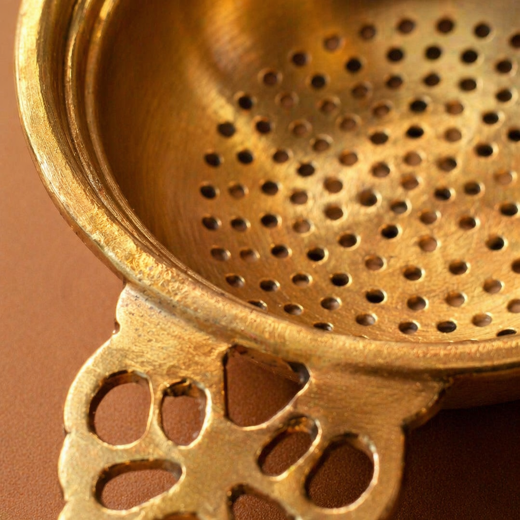 Moradabad Brass Tea Strainer with Rest, The Brass Atelier. Handmade in India by House of Taraasha.