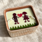 Love Candle, Couple, Dried Rose in Terracotta, close-up of the wax top