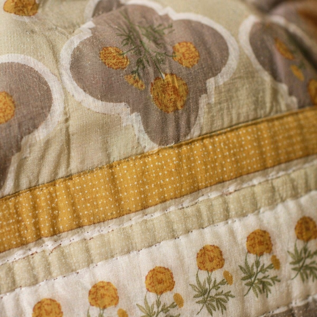Marigold Jaali Ivory and Taupe Cotton Quilt, The Linen Room. Handmade in India by House of Taraasha.