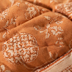 Rust & Off-White Marigold Motif Bedsheet, The Linen Room. Handmade in India by House of Taraasha.