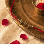 Handcrafted — Brass Bird Rakhi in Red