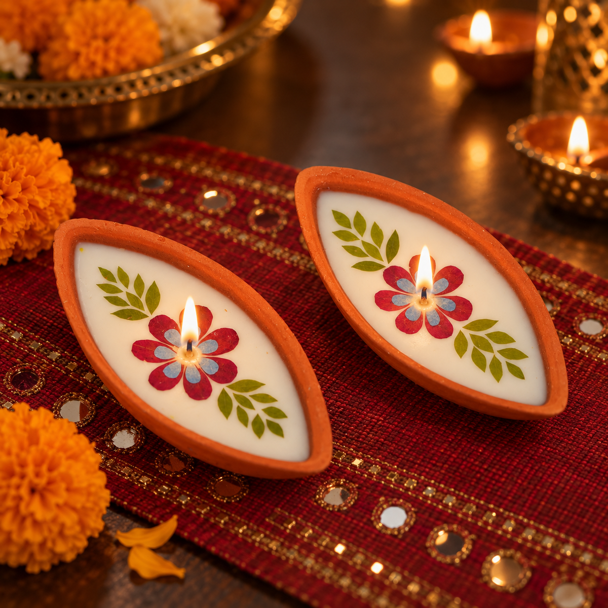 Boat-Shaped Pressed-Flower Terracotta Diyas, lit for Diwali