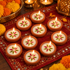 Mini Pressed-Flower Terracotta Diyas, 10 in 5 Gift Boxes, lit for Diwali
