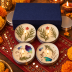 Lavender and Lemongrass Tin Candle Gift Box, Set of 4, lit for Diwali on a mirror-work runner