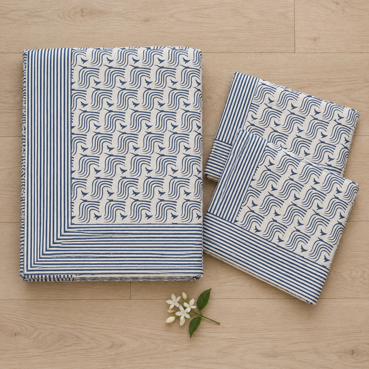 Blue Wave Print Bedsheet Set, folded with its pillow covers