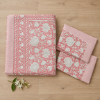 Pink Floral Jaal Bedsheet Set, folded with its pillow covers