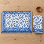 Blue Vine Floral Placemat and Napkin Set of 12, placemats and napkins stacked, seen from above