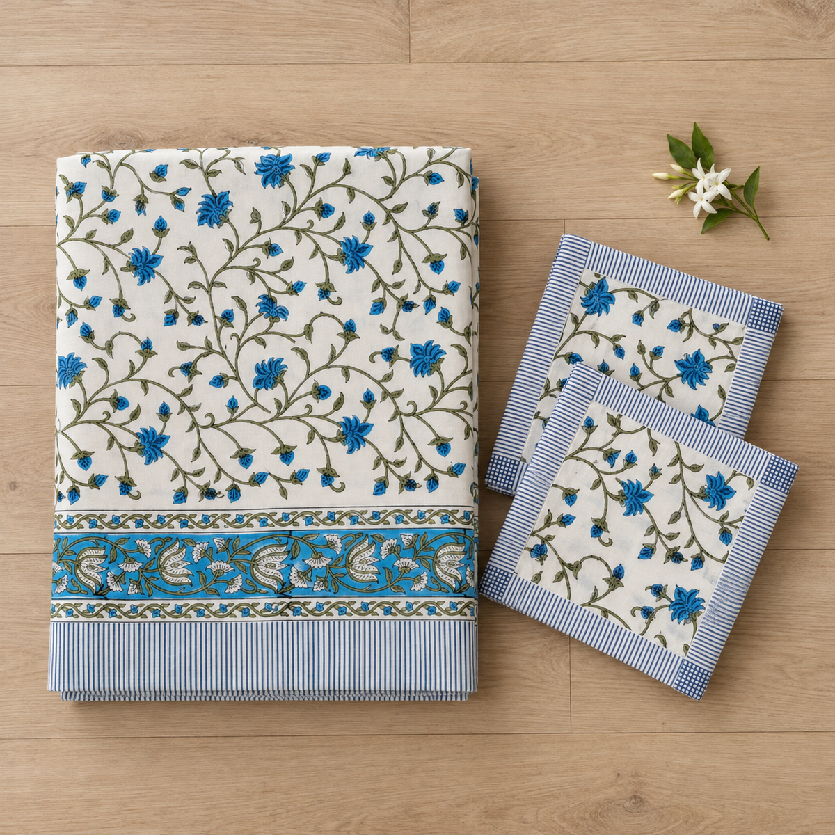 Blue Floral Vine Bedsheet Set, folded with its pillow covers