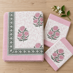 Pink Floral Buta Bedsheet Set, folded with its pillow covers