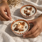 Whole-Spice Soy Wax Candles in Terracotta, Set of 2, being lit by hand