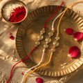 Hand-Strung Spiral Coin — Brass Bead Rakhi Set