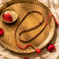 Hand-Strung Rudraksha — Thread Rakhi for Brother
