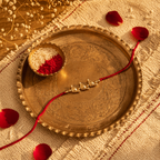 Handcrafted — Brass Bird Rakhi in Red