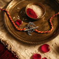 Ganesha Bansuri — Hand-Finished Silver Rakhi