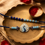 Meenakari Peacock — Hand-Set Rakhi Duo