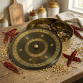 Kitchen masala box or spice box made with Pure Brass in an Antique Kanjeevaram Design. The masala box comes with 7 detachable containers and spoon