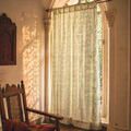 Karhuwa Summer Leaves Cutwork Sky Blue Sheer Curtain, The Draped Window. Handmade in India by House of Taraasha.