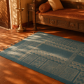 Mandana Teal Hand-Printed Tribal Pattern Cotton Rug, The Woven Floor. Handmade in India by House of Taraasha.