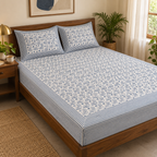 Blue Wave Print Bedsheet Set, on a made double bed in a bright bedroom