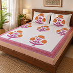 Orange Poppy Bedsheet Set, on a made double bed in a bright bedroom